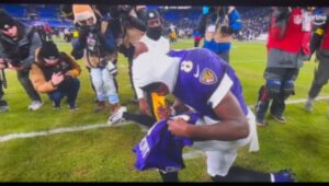 Video: Cousin, James Pierre, Begging On One Knee For Lamar Jackson To Sign His Autograph On His Jersey 8 incollage 20250112 0742517223442115163146761795 300x170 2